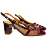 Zapatos tipo sandalia Vizzano color vino tinto con tacón grueso y detalles transparentes.
